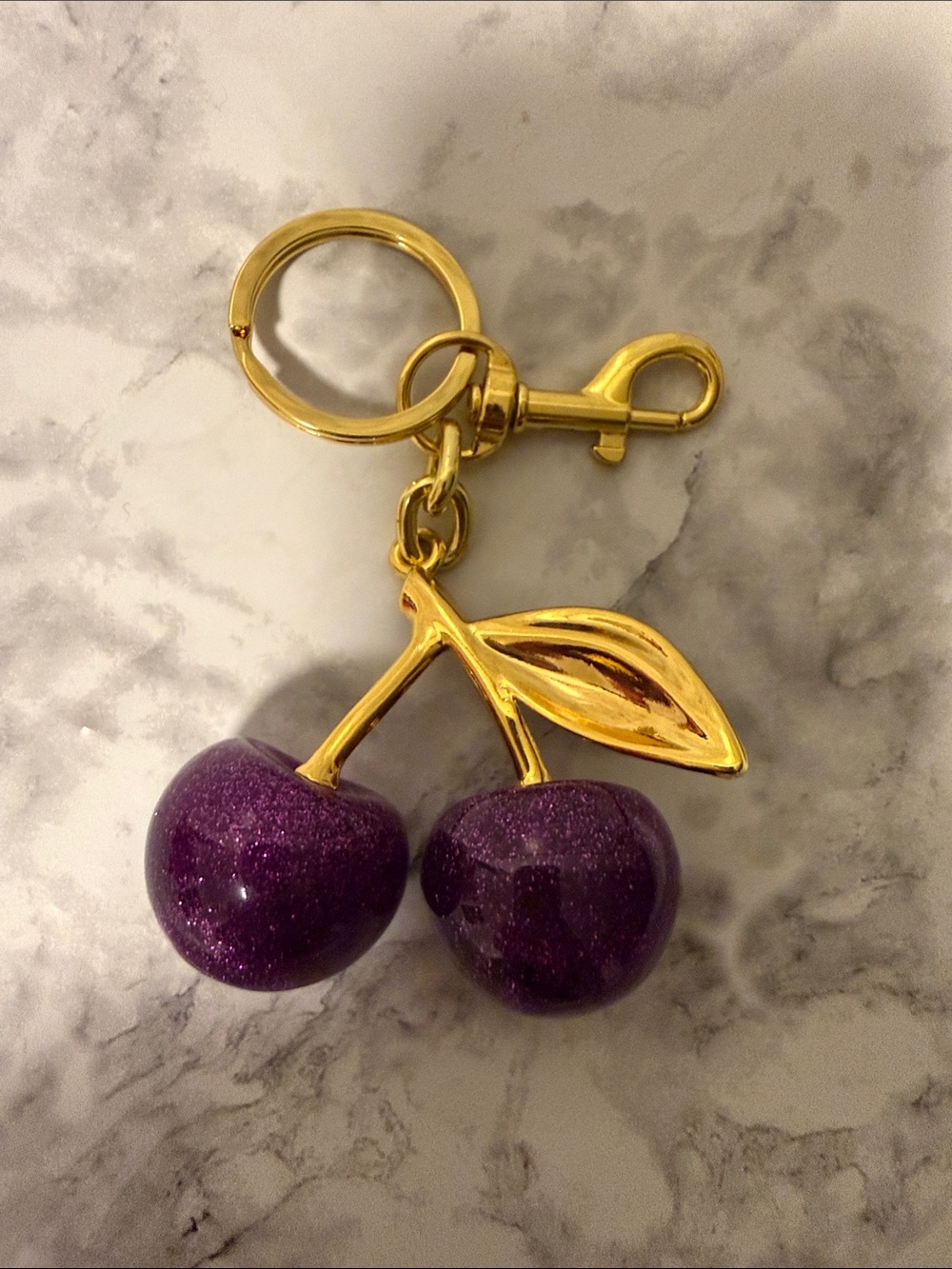 Purple Cherry bag charm gold tone